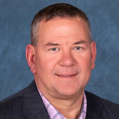 headshot for Brad Baumann