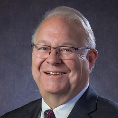 headshot for Dave Hewett