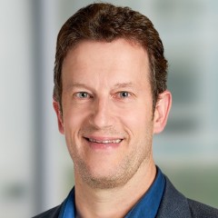 headshot for John Gartner