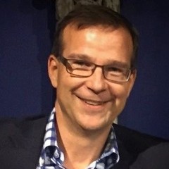 headshot for Joel Lindholm