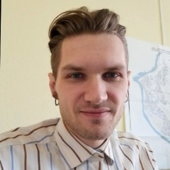 headshot for Aleksei Pleshakov