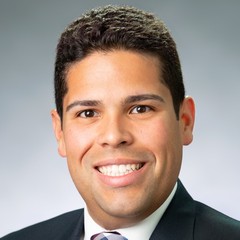 headshot for Carlos Santiago